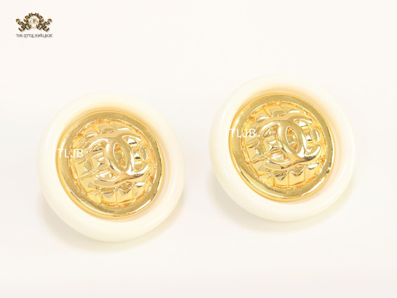 Double C gold and white enamel studs