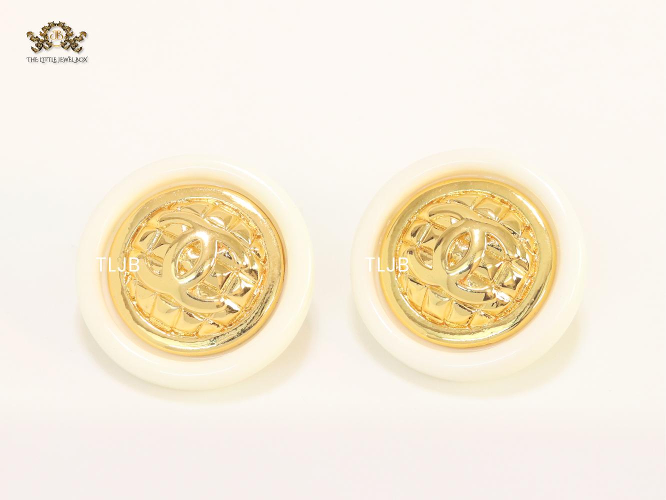 Double C gold and white enamel studs
