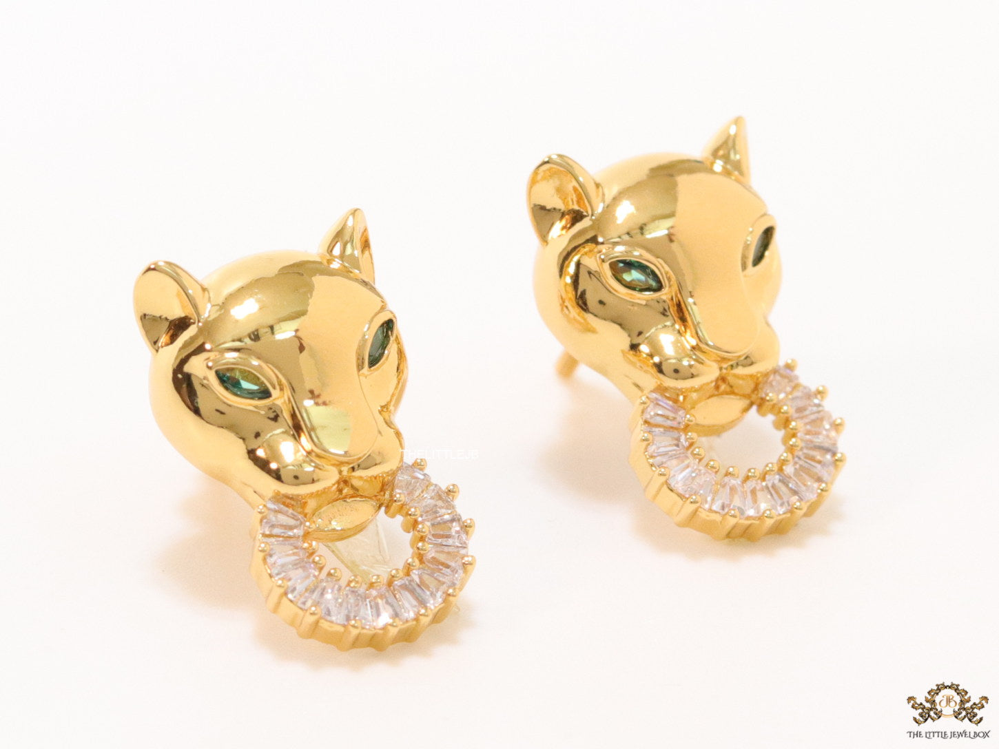Golden panther face studs with cz baguette ring