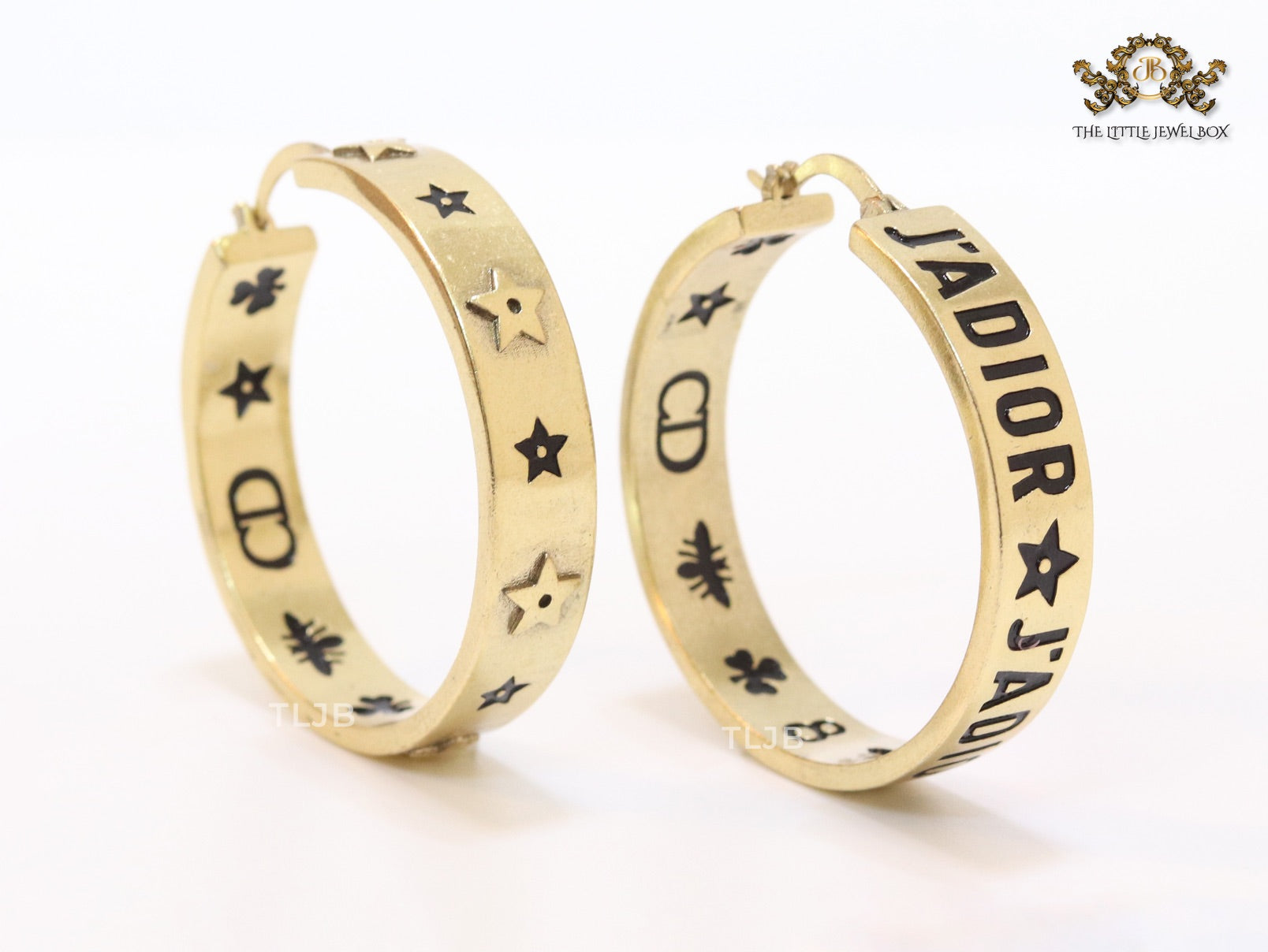 Alphabet C and D embossed on gold hoops