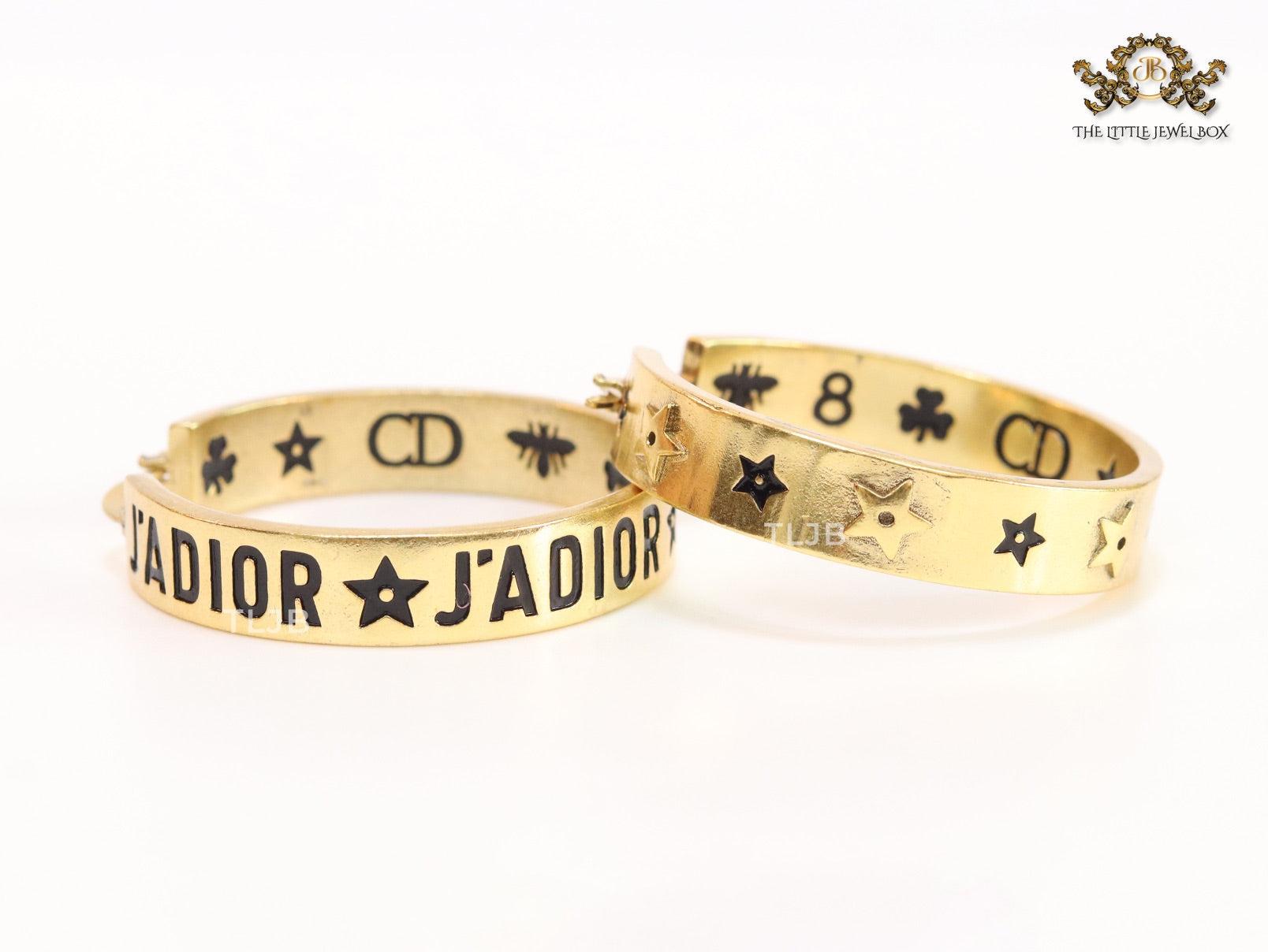 Alphabet C and D embossed on gold hoops