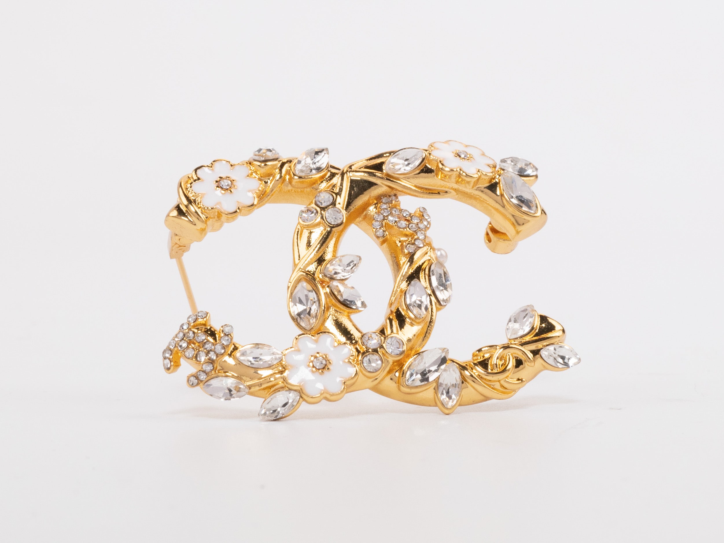 Gold Double C brooch with enamel flowers and cz leaves