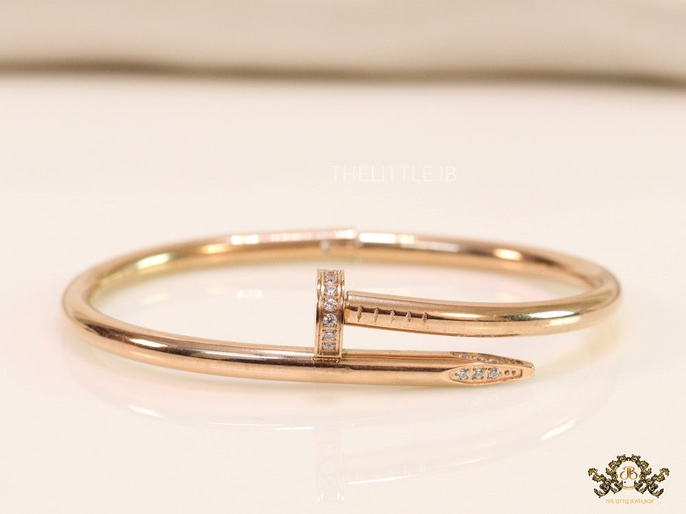 Rose gold plated nail bracelet with cz
