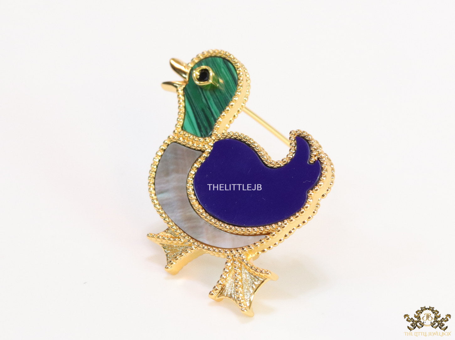Gold plated multi-colour bird brooch