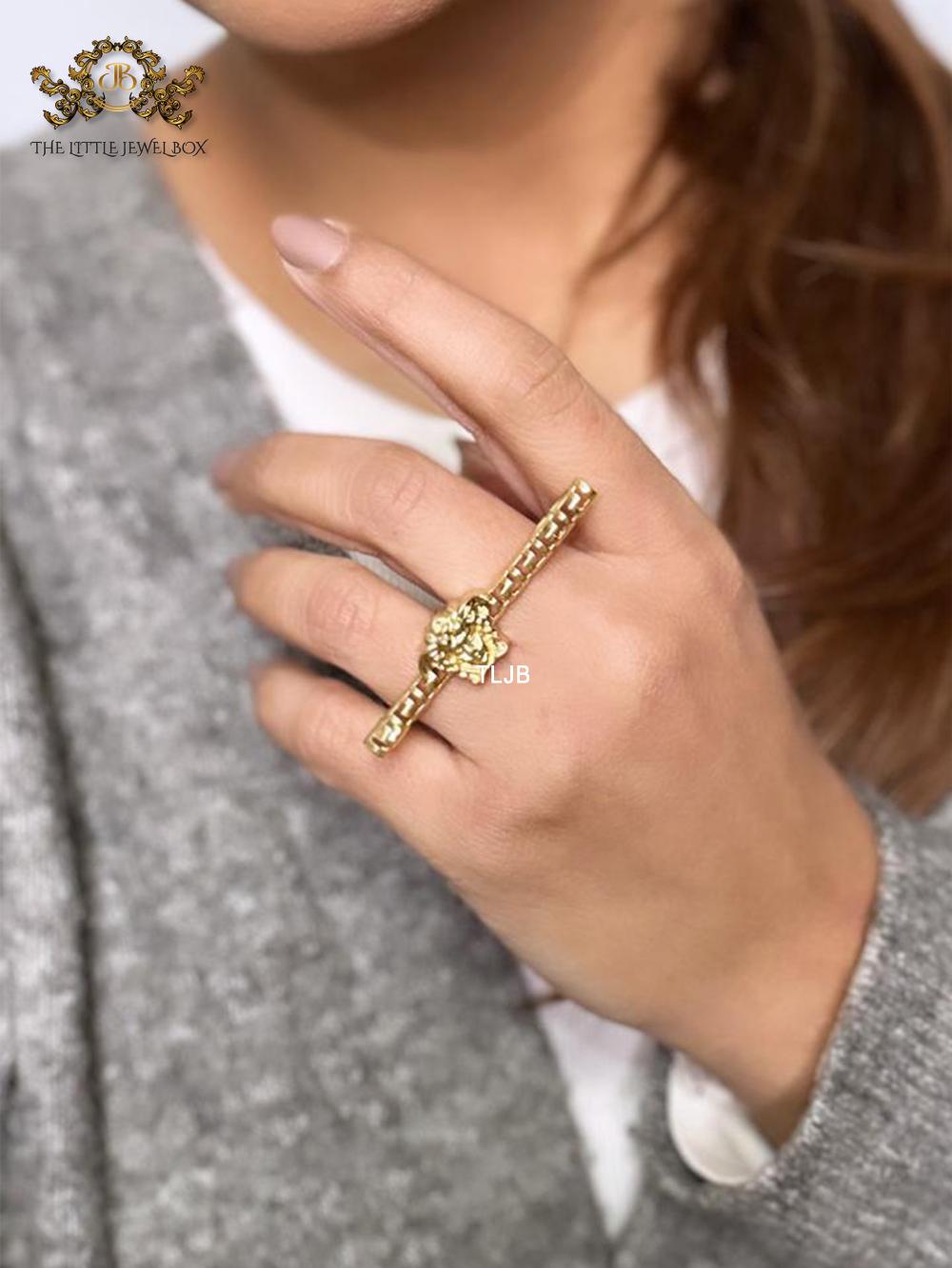 Gold plated embossed medusa statement ring