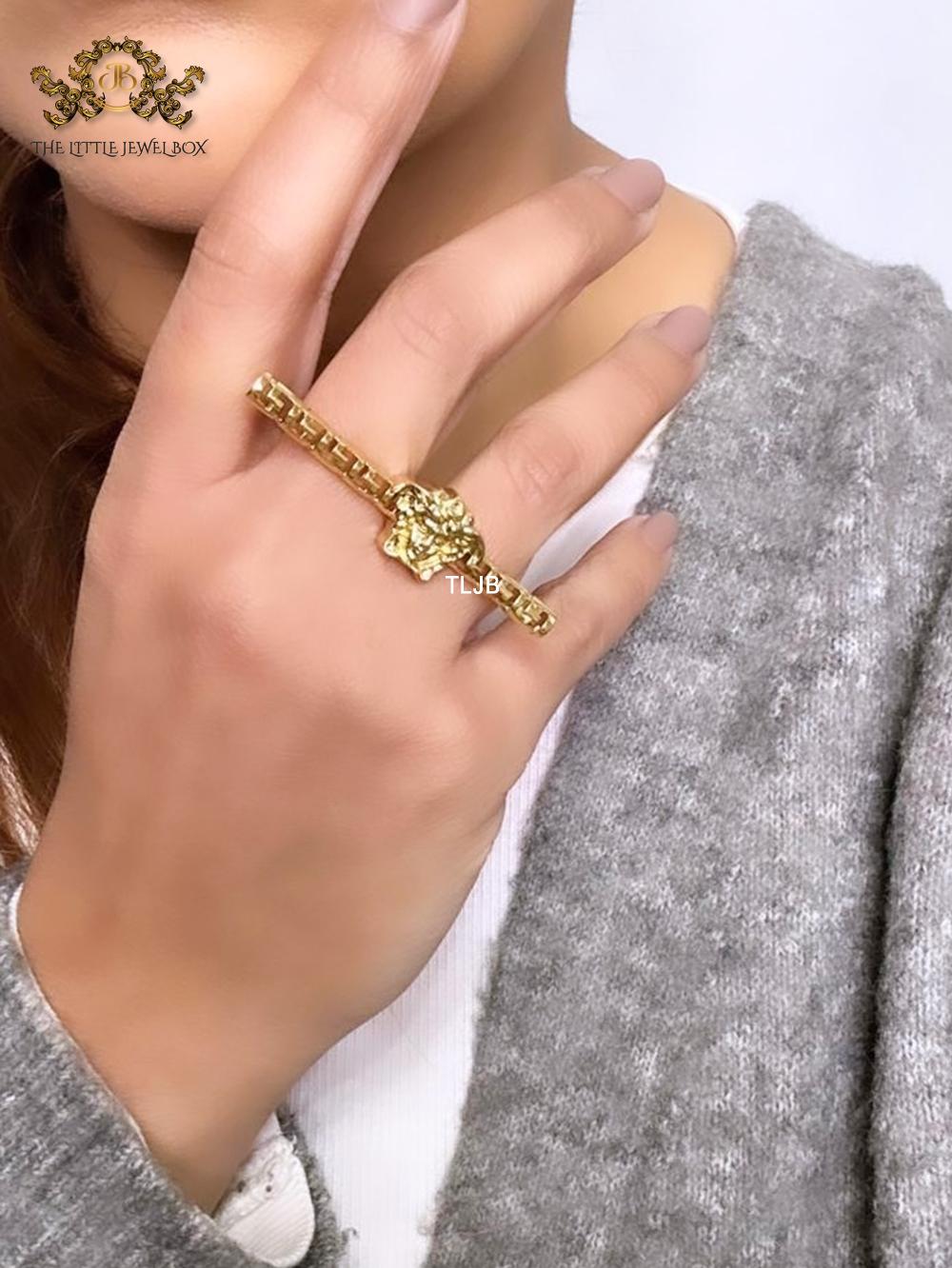 Gold plated embossed medusa statement ring