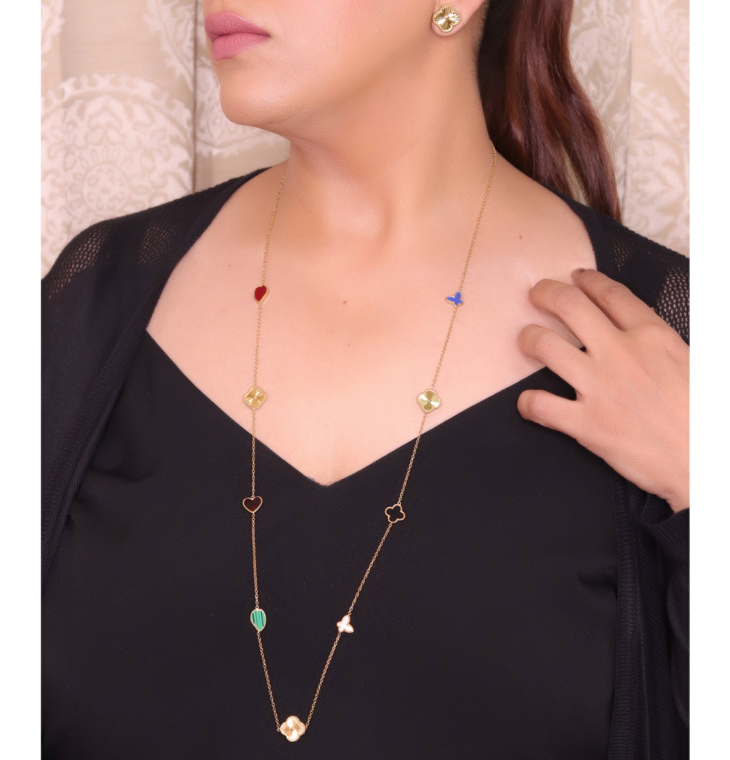 Multi colour clover heart and other shape charms on a sleek long gold plated chain with matching studs