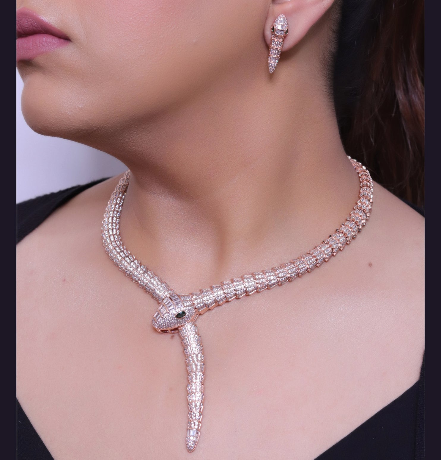 Rose Gold plated cubic zirconia stones ancient serpentine symbol necklace with matching studs
