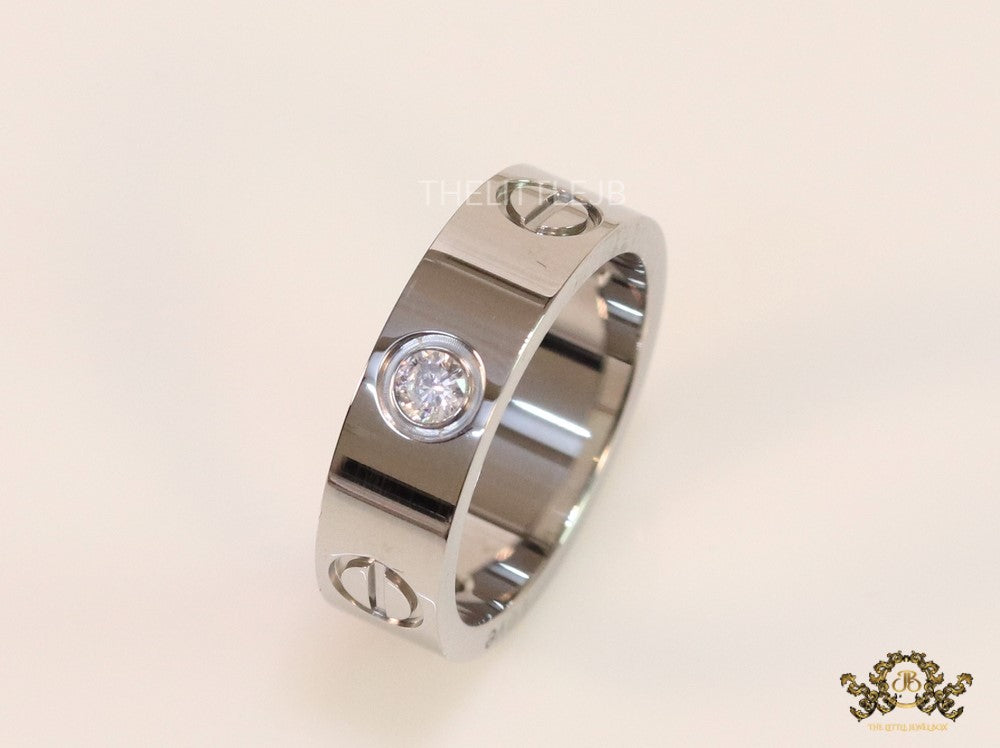 Broad 6mm platinum plated band with screws and stones