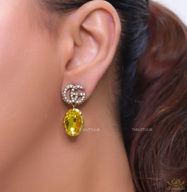 Rustic double G earings with oval yellow topaz drop