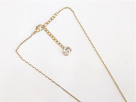 Alphabet G ruby drop pendant