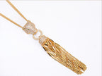 Gold panther face sleek tassel pendant