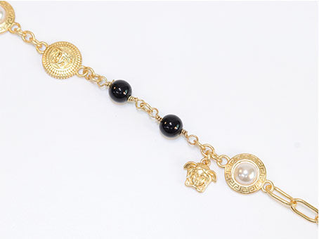 Gold medusa charms bracelet