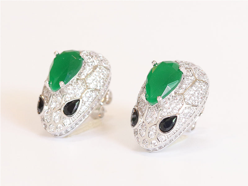 Emerald snake head studs