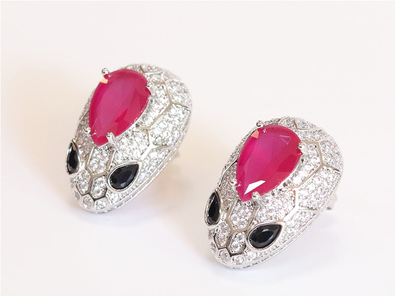 Ruby snake head studs