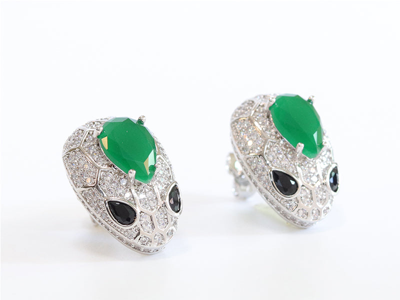 Emerald snake head studs