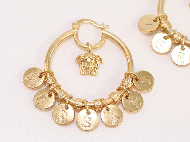 Alphabet embossed charm hoops