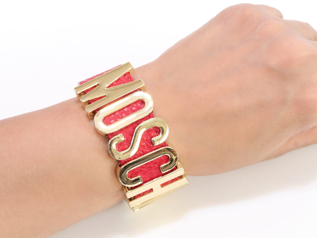 Alphabet M red colour bracelet in gold finish