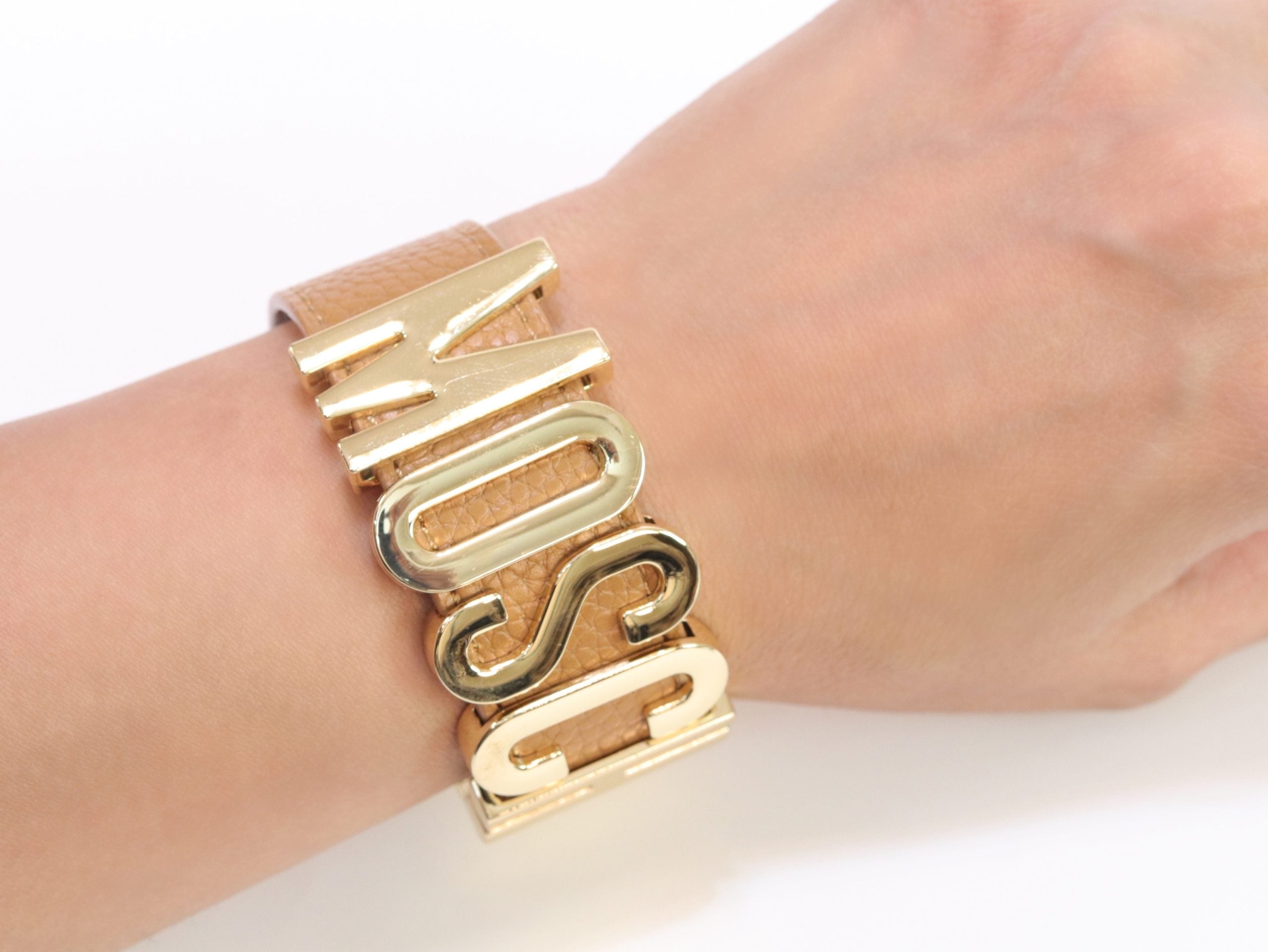 Alphabet M tan colour bracelet in gold finish
