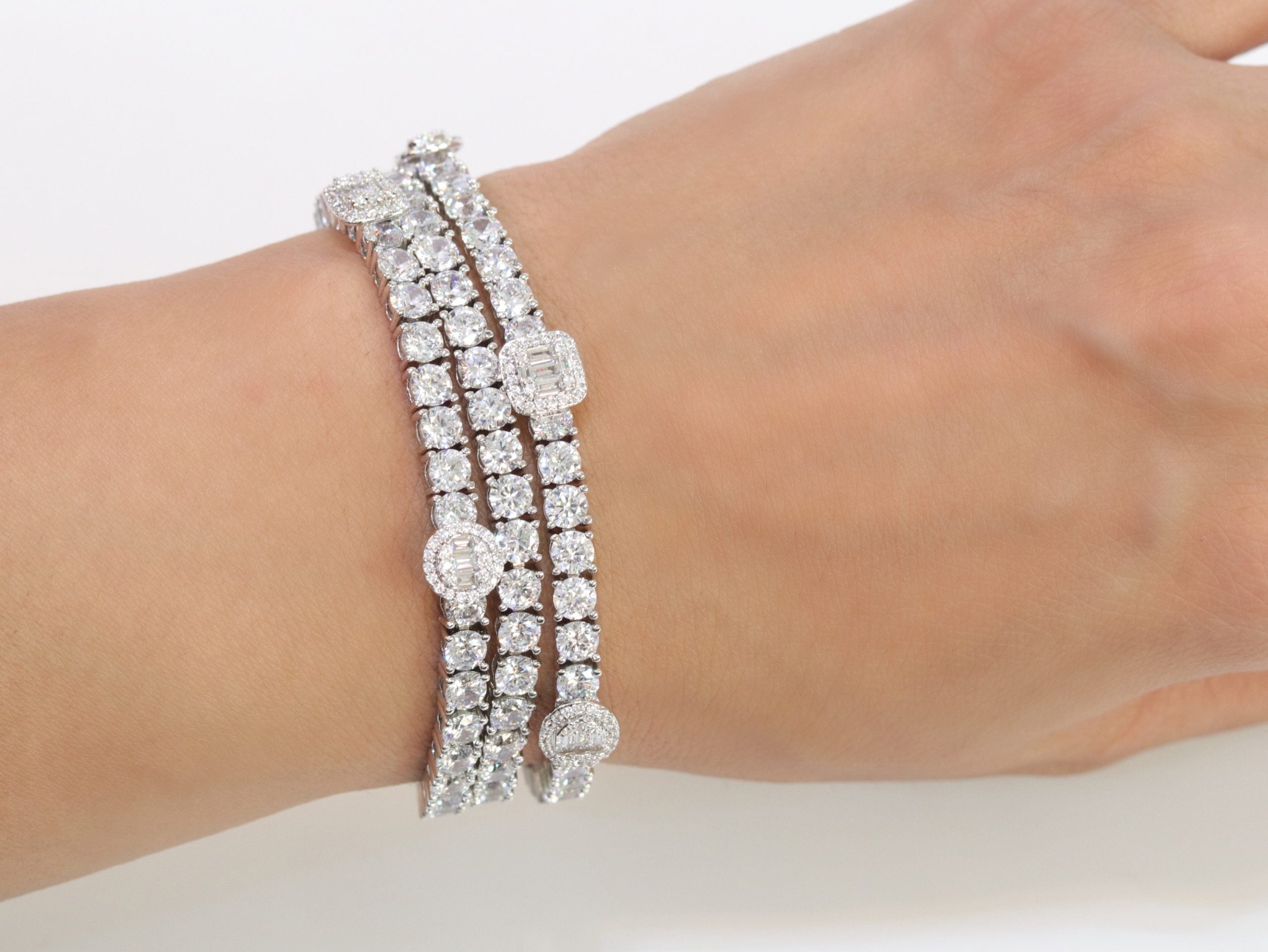 Triple Stacked multiple cut CZ bracelet in platinum finish