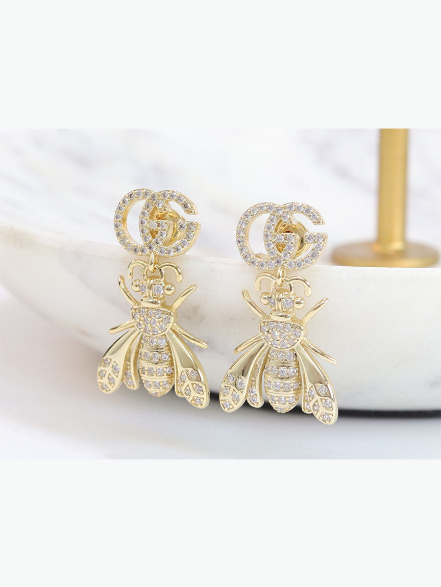 Double G gold dragon fly CZ dangles