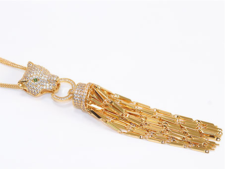 Gold panther face sleek tassel pendant