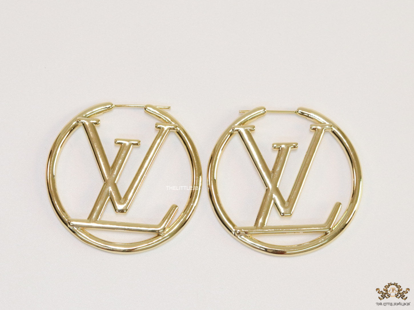 Gold plated L and V alphabet hoops 50 mm