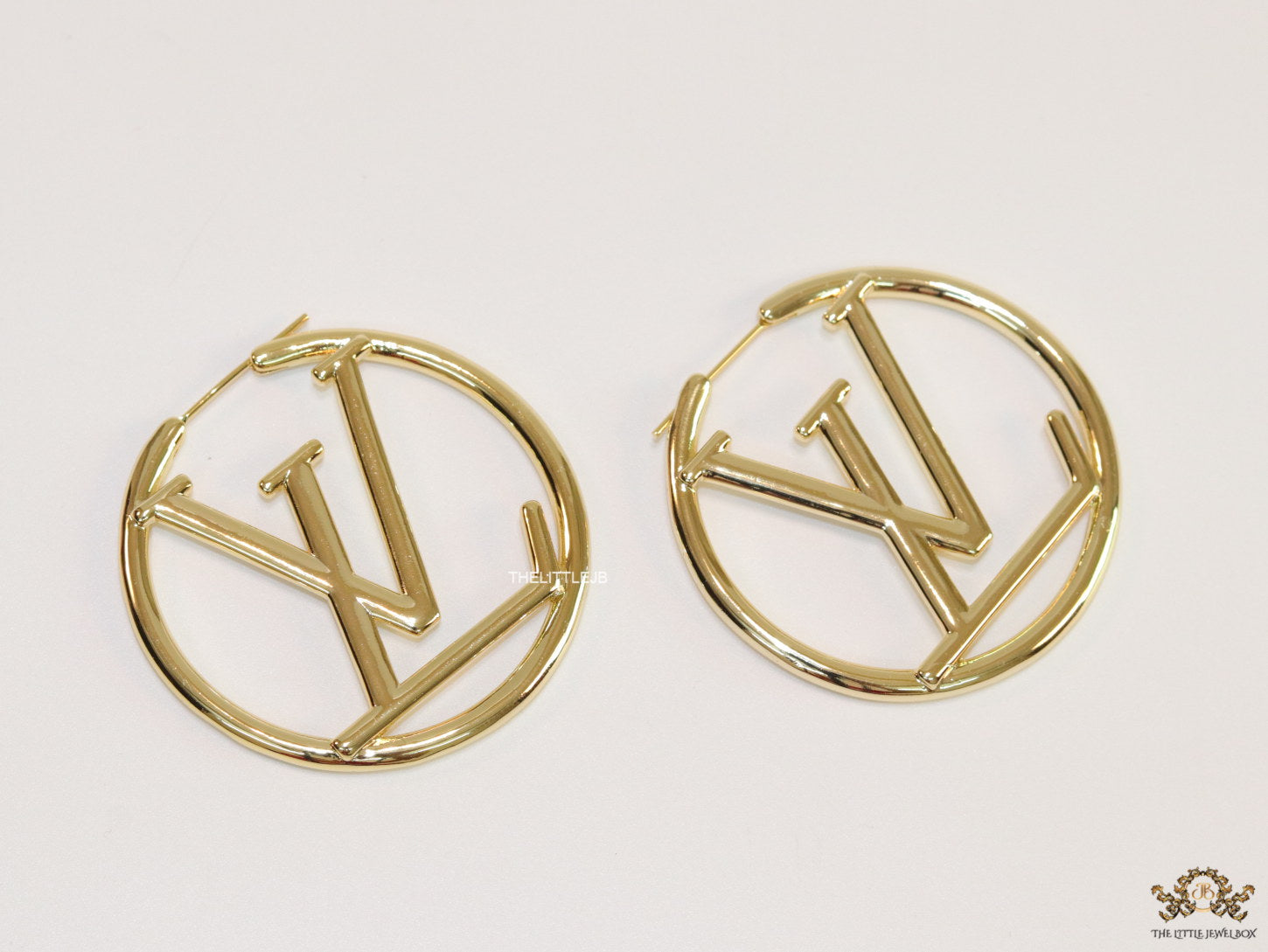 Gold plated L and V alphabet hoops 50 mm