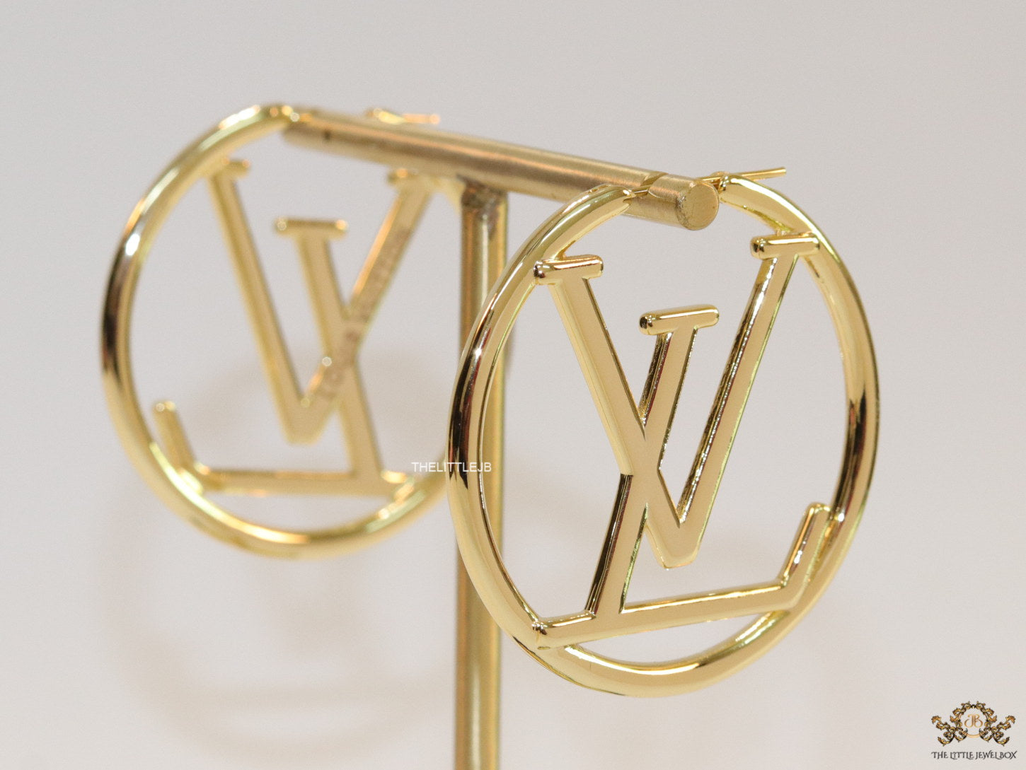 Gold plated L and V alphabet hoops 50 mm