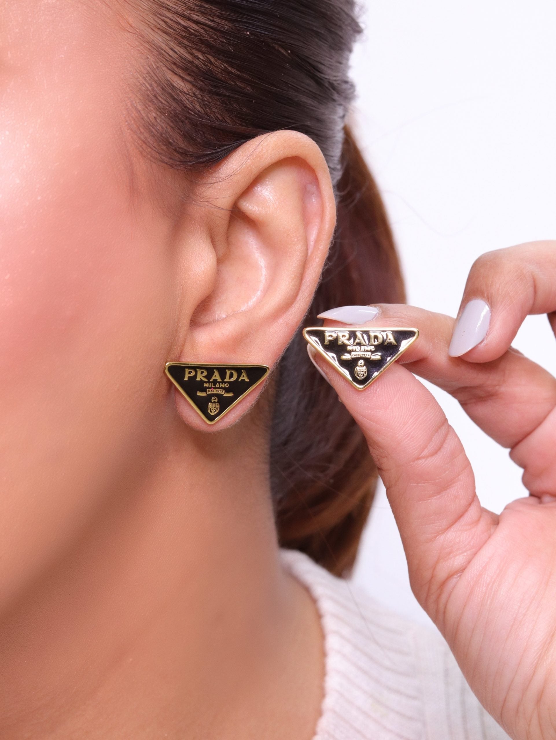 Black & gold enamel studs