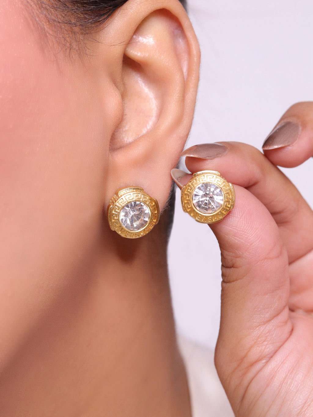 Gold Round solitaire Studs with medusa motif
