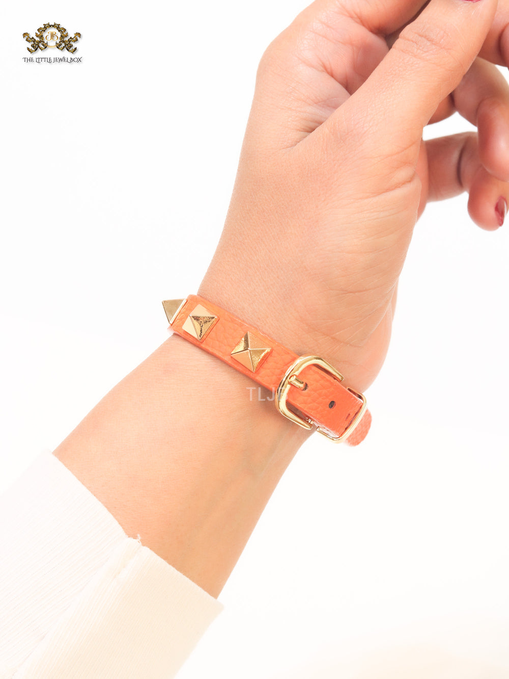 Alphabet V rockstud orange bracelet