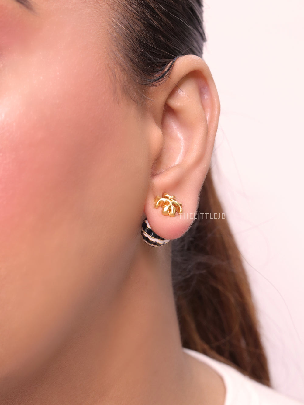 T Motif Black & white bomber studs