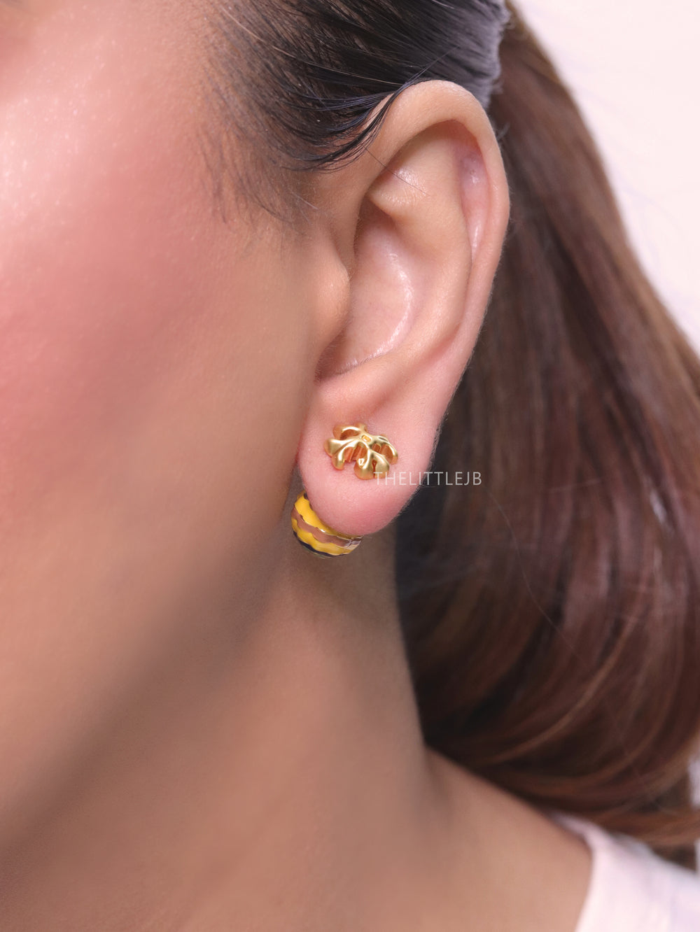 T Motif yellow and blue bomber studs