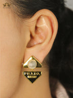 Alphabet P black triangle Studs