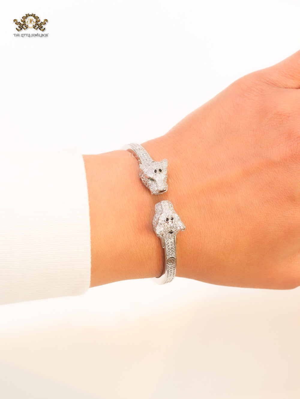Panther heads platinum plated and emerald bracelet