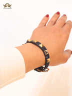 Alphabet V rockstud black bracelet
