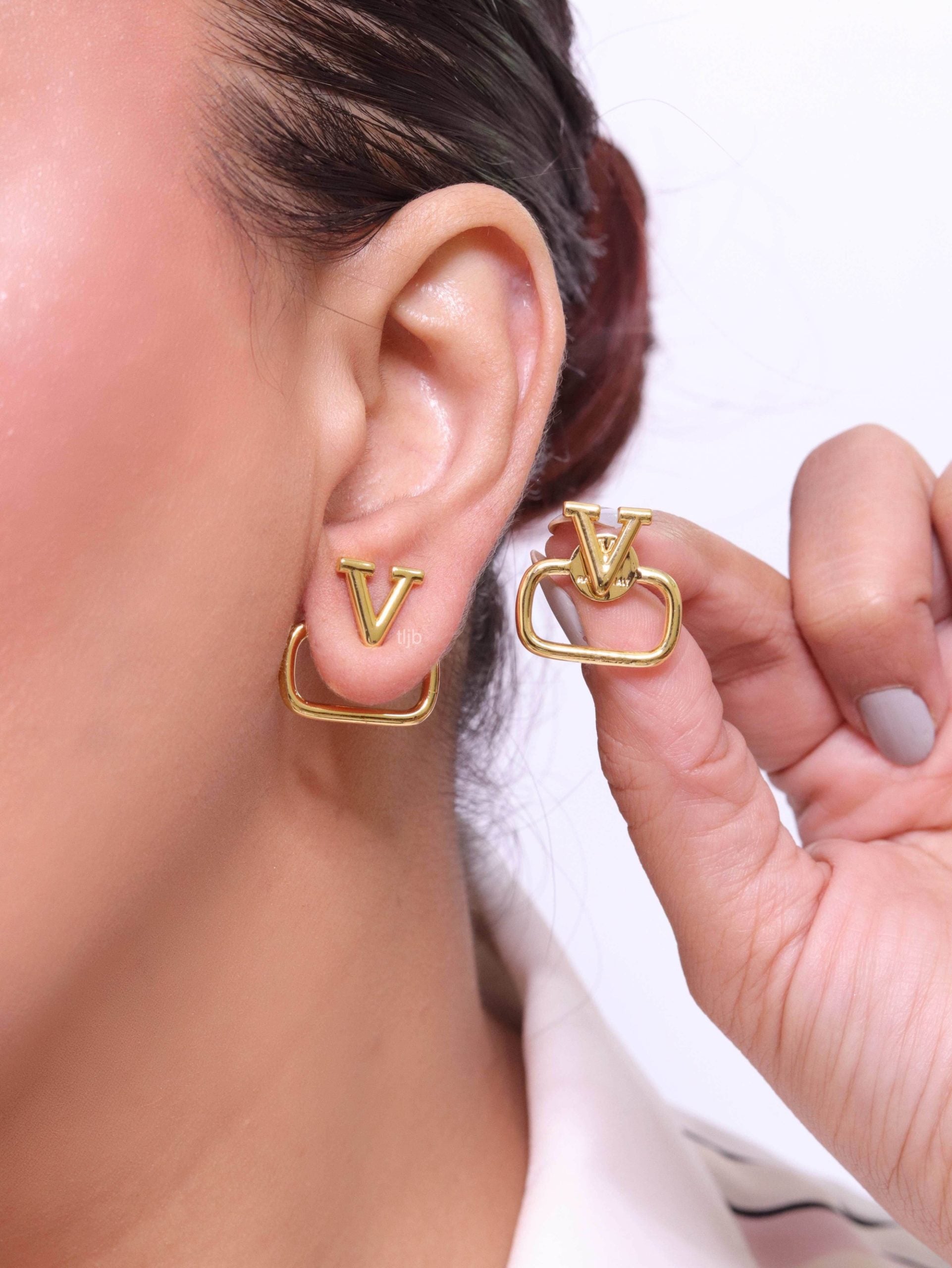 Alphabet V golden studs