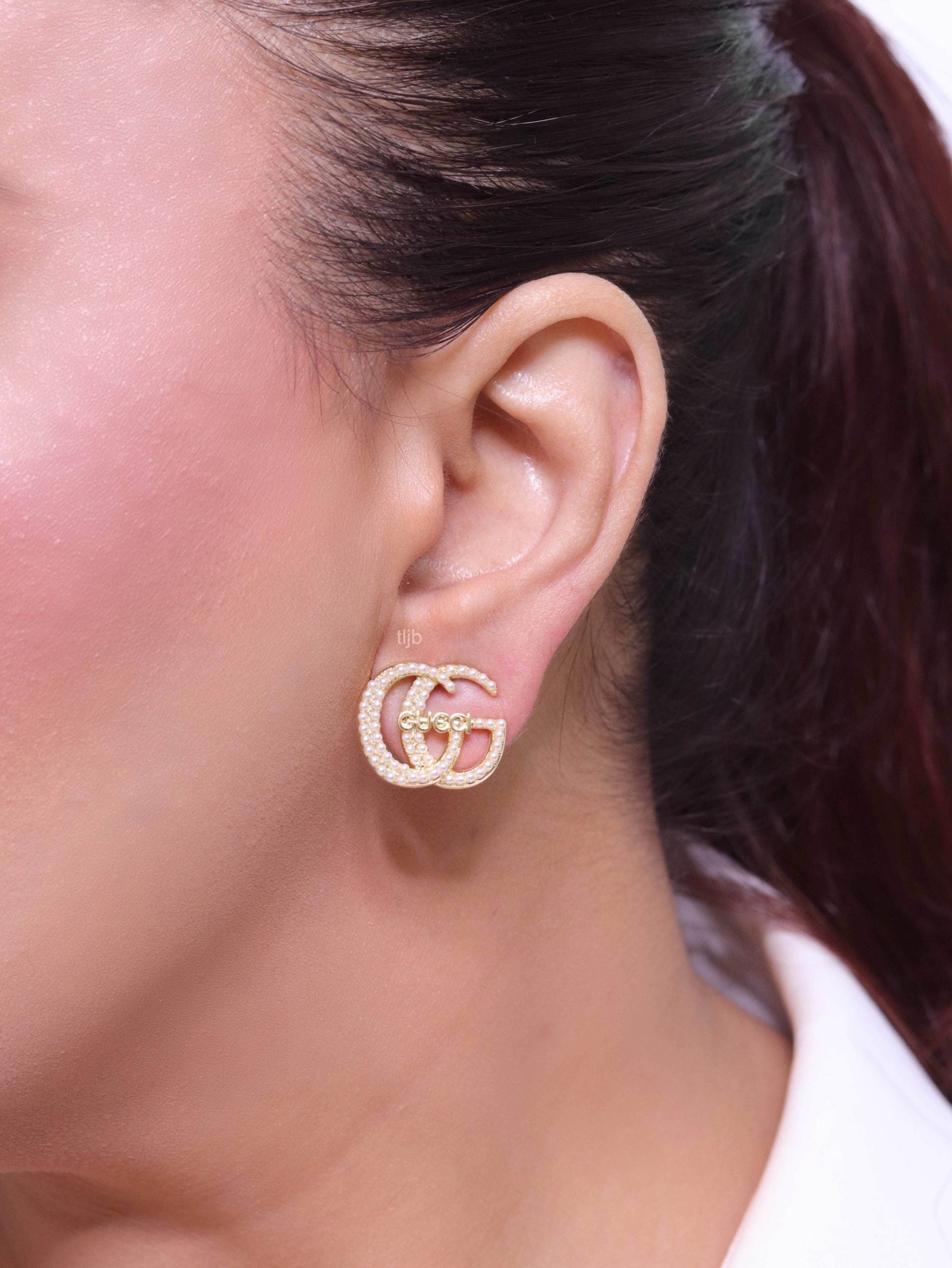 Double G pearl earrings in gold finish