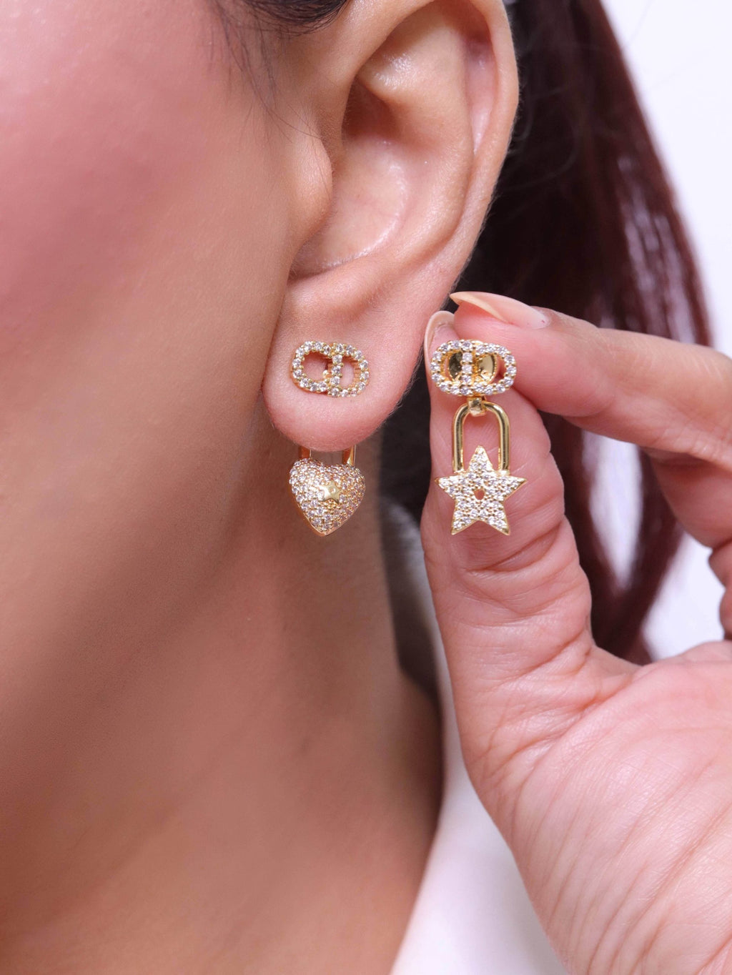 Alphabet C and D lock and star dangling stud in gold finish with cz