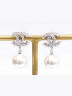 Double C cz baguette and pearl silver earrings
