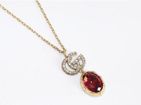 Alphabet G ruby drop pendant