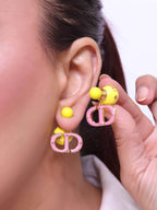 Pink and Yellow alphabet CD stud in gold finish
