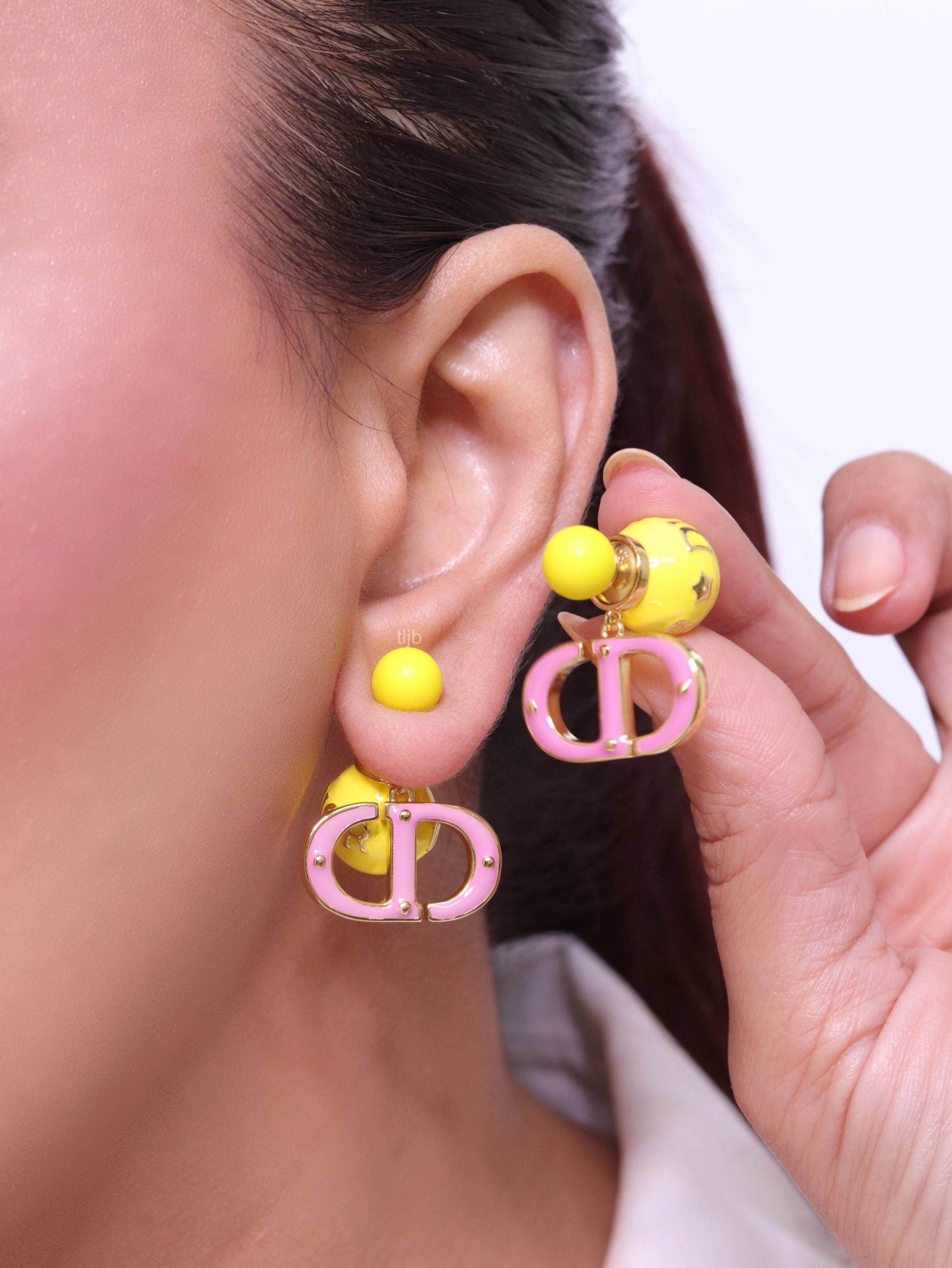 Pink and Yellow alphabet CD stud in gold finish