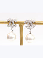 Double C cz baguette and pearl silver earrings
