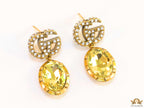 Rustic double G earings with oval yellow topaz drop