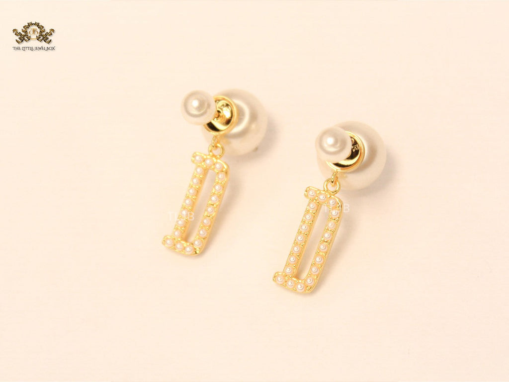 alphabet D pearl studded bomber earrings
