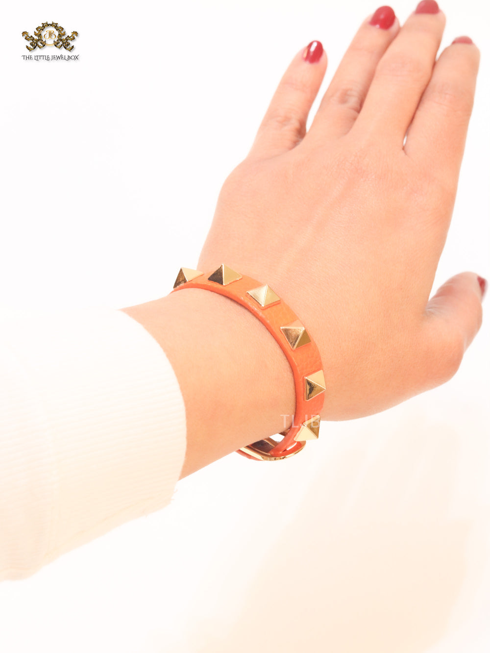 Alphabet V rockstud orange bracelet