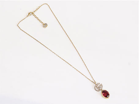 Alphabet G ruby drop pendant