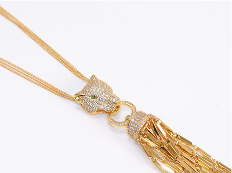 Gold panther face sleek tassel pendant